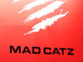 TGS 2013ϡBLAZBLUEפȡ֥IVפΥӥޥåƥץ󥿥ȥθͽԤ줿Mad Catz֡ݡ